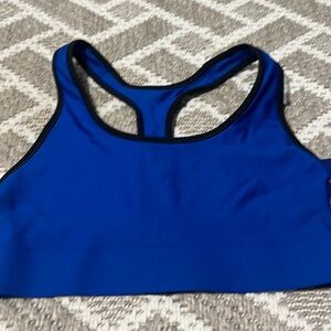 Champion women’s  Royal blue  Size Medium Racerback sports bra.